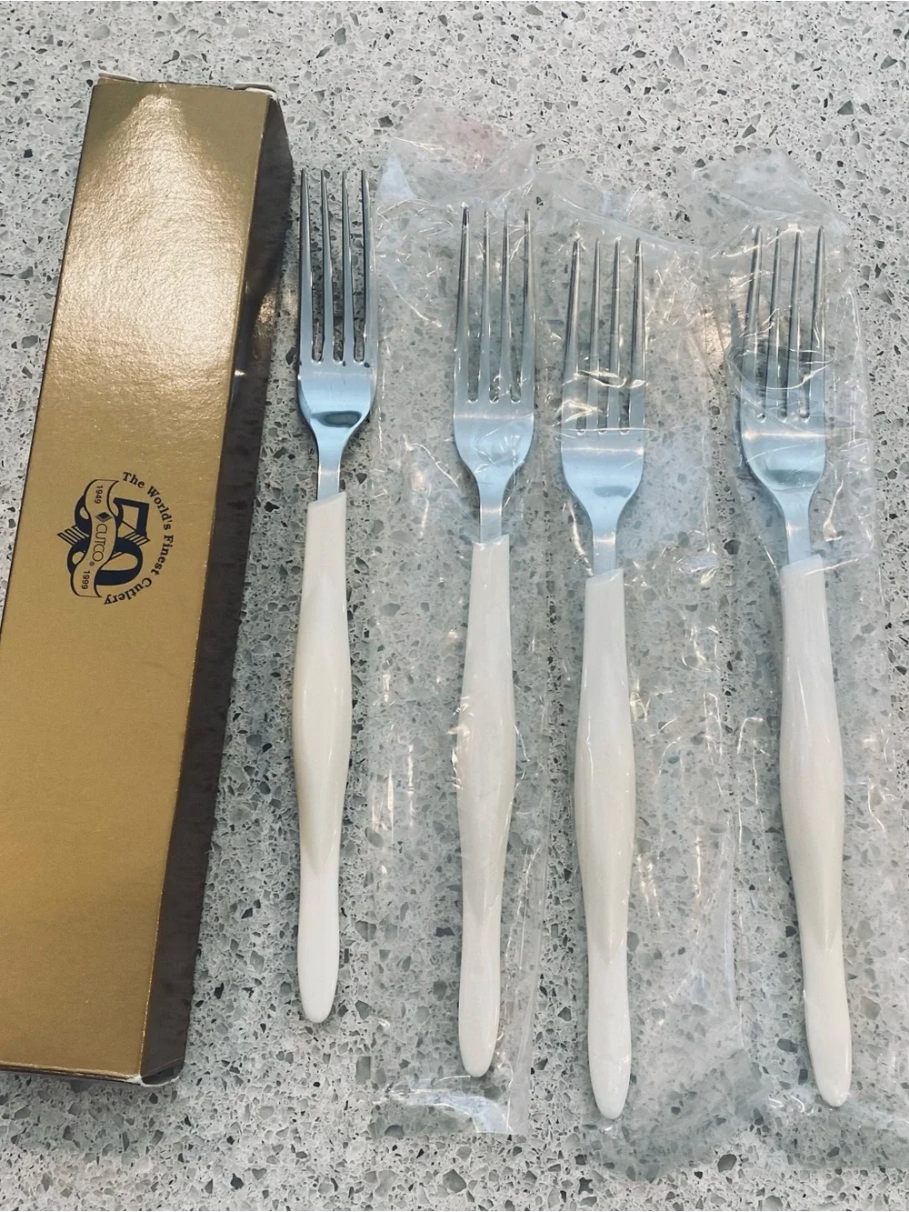 8 dinner forks, 4 salad forks, 8 soup spoons, and 4 tablespoons.